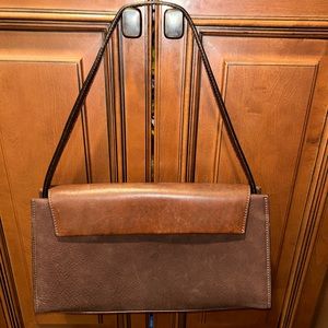 Brand new leather and suede handbag.
